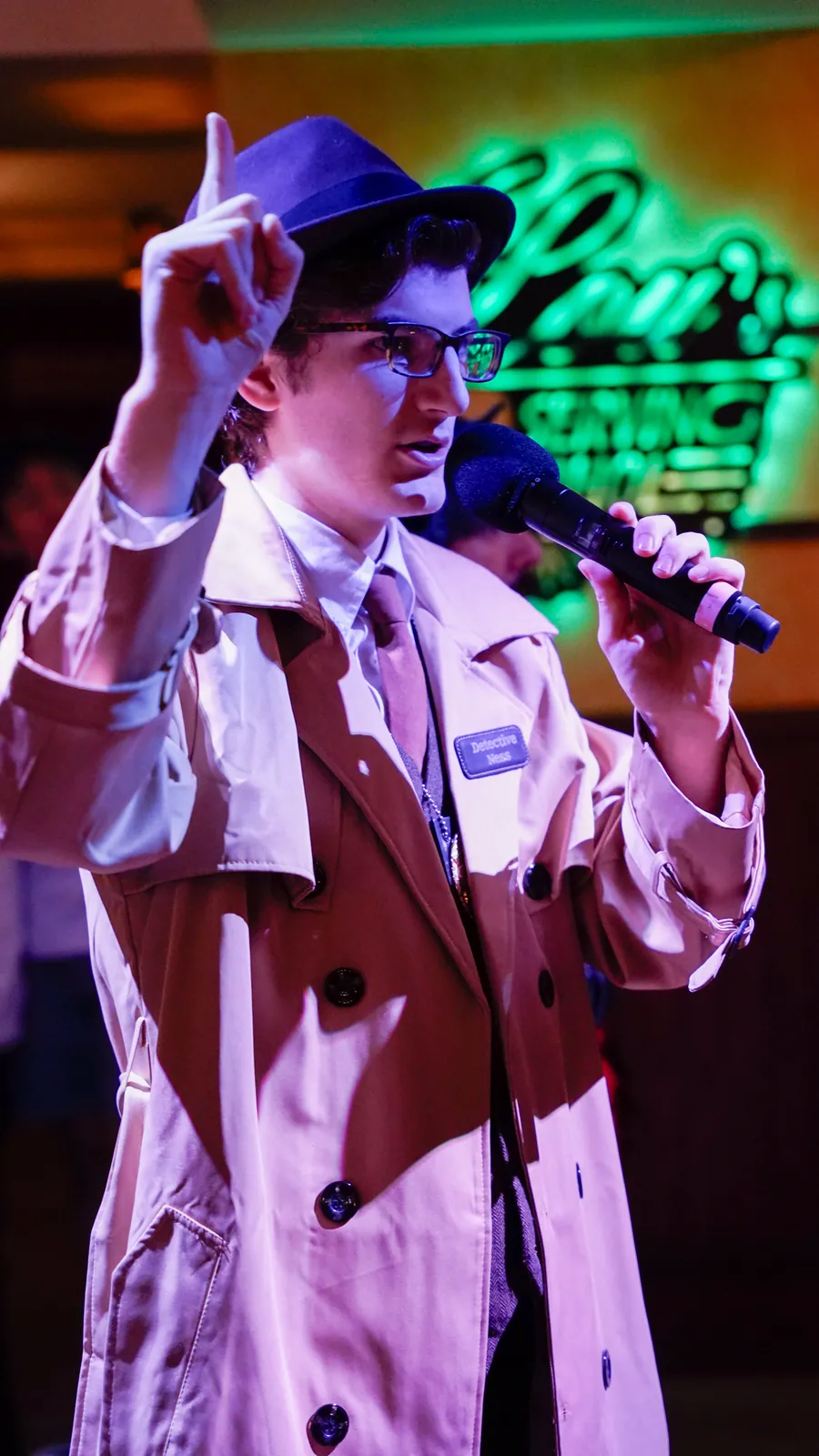 A Murder Mystery Company actor working the room at a Anchorage show